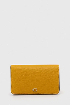 фото шкіряний гаманець coach жіночий колір жовтий